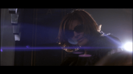 Thomas Crown_et enfin le visage que le lens flare rend irréel